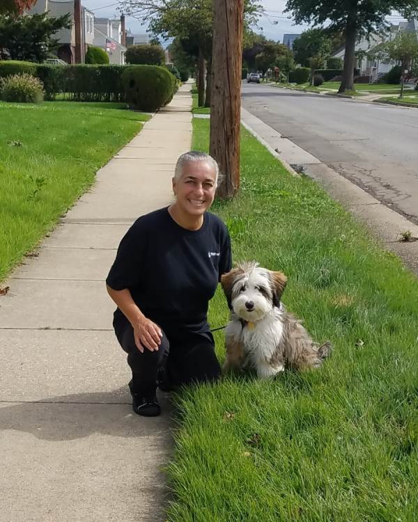 Vanda walking a dog in Nokomis