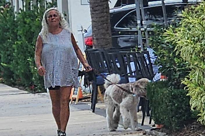 Vanda walking a dog in Nokomis